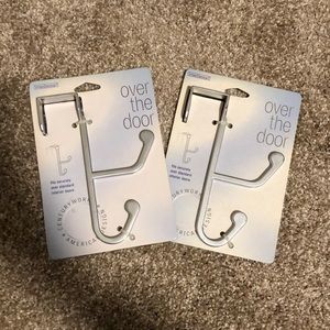 Two brand new over the door hooks